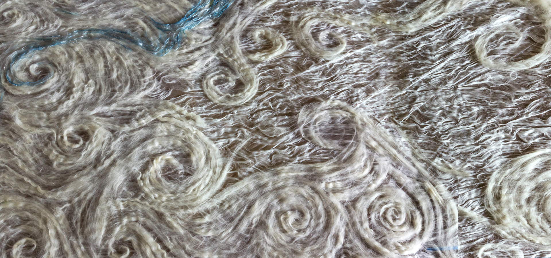 Wool threaded in circles and swirls