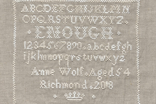 Stitched wording on linen