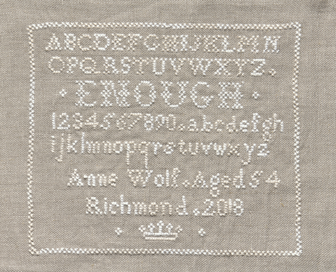 Stitched wording on linen