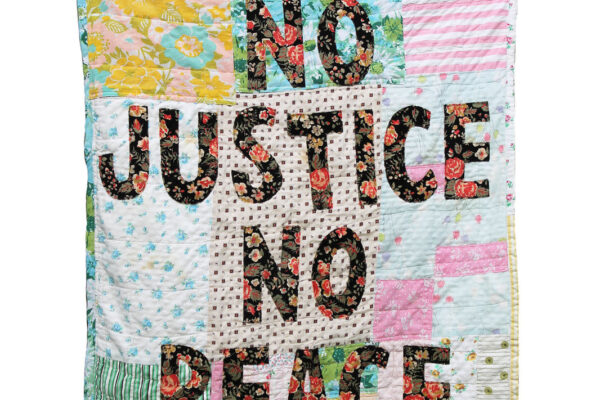 Quilt that says No Justice No Peace