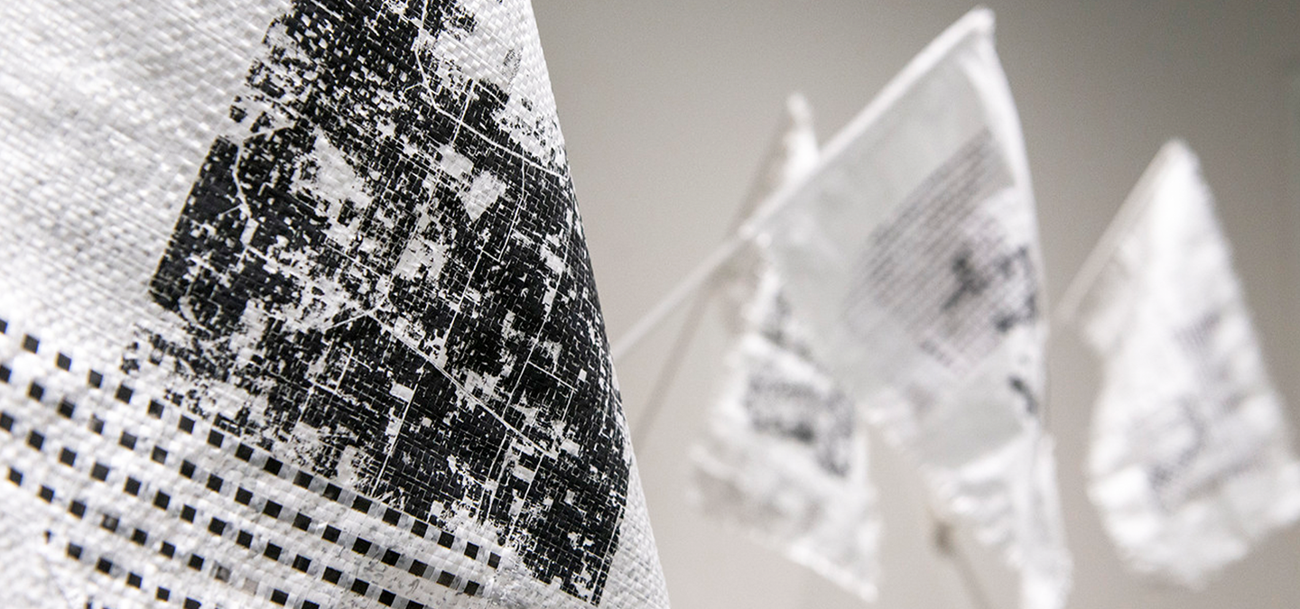 Screen-print Flags, weaving, and maps on rice bags