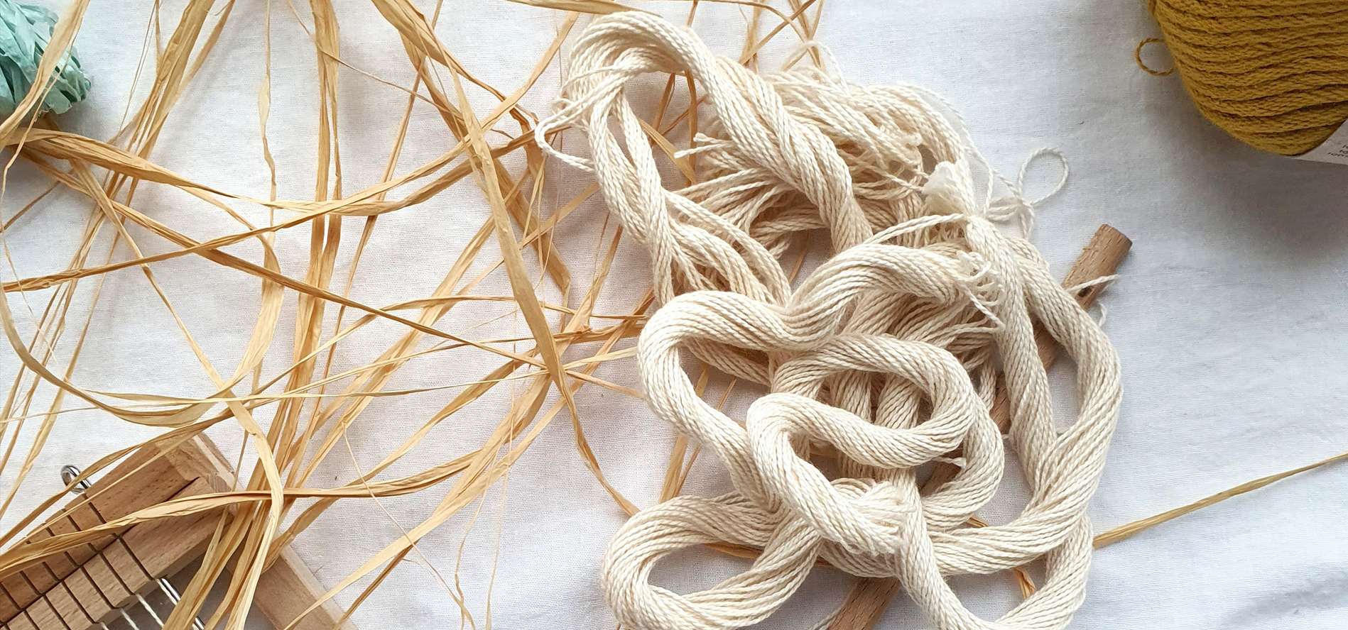 Loom and a jumble of yarn