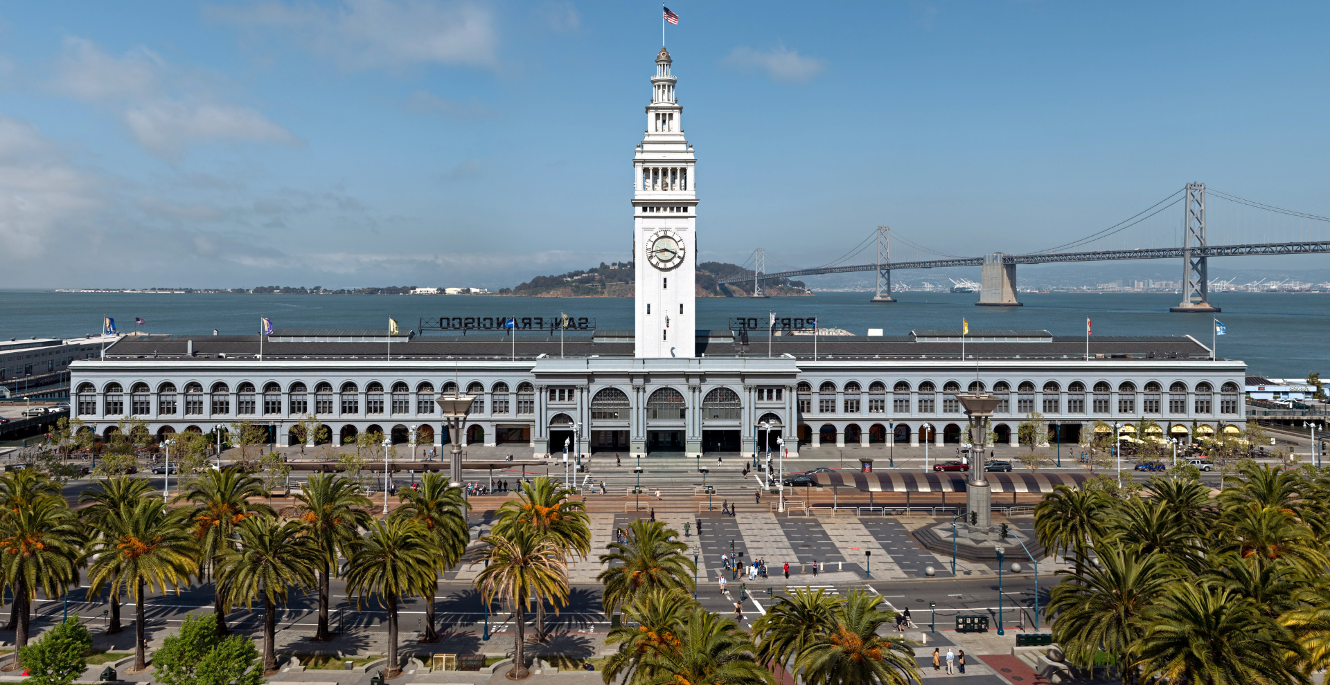 Ferry Building in San Francisco with bridge behind it
