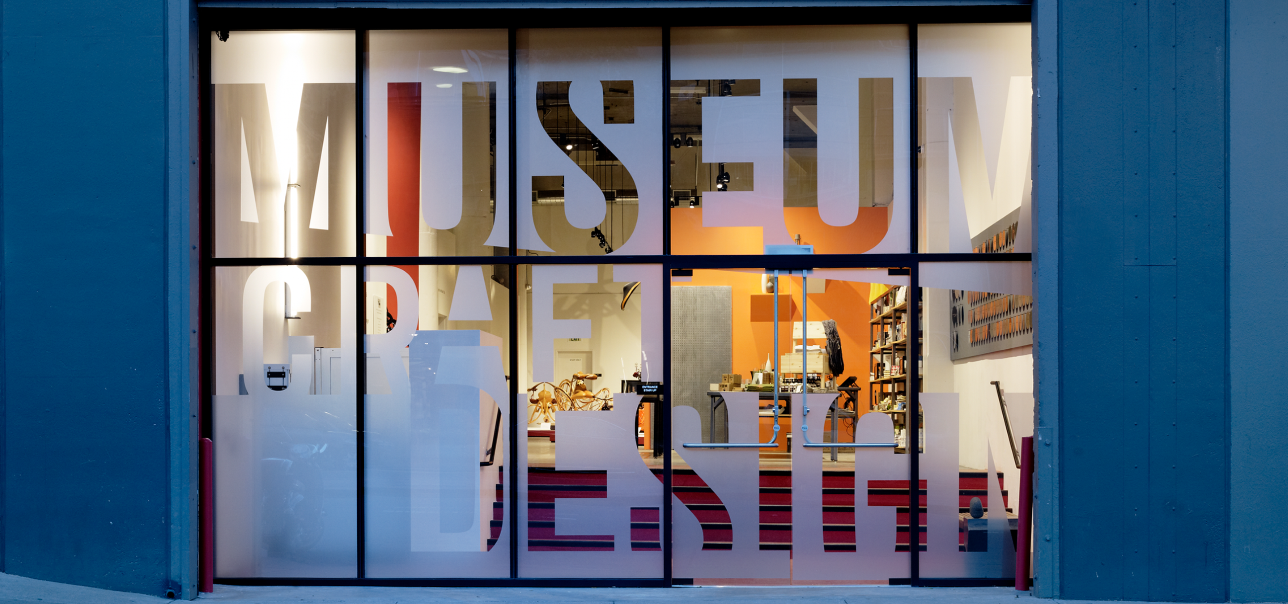 Street view shot of the museum of craft and design's window front.
