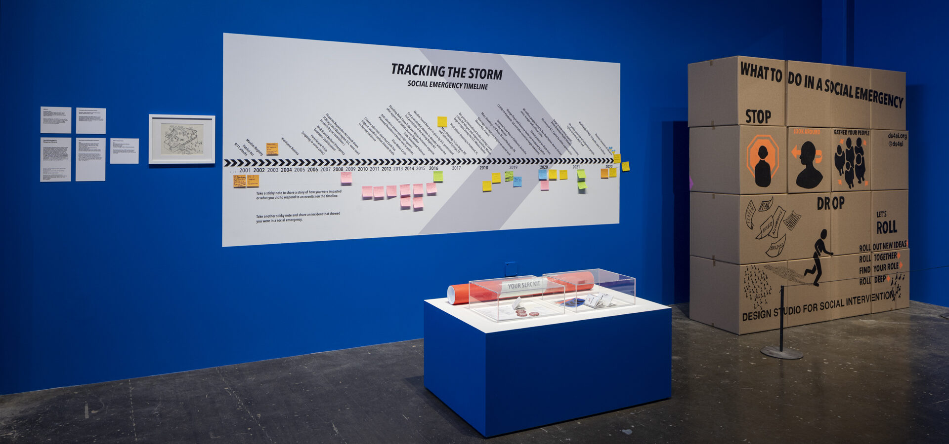 Installation view of Tracking the Storm, social response timeline for Designing Peace exhibition