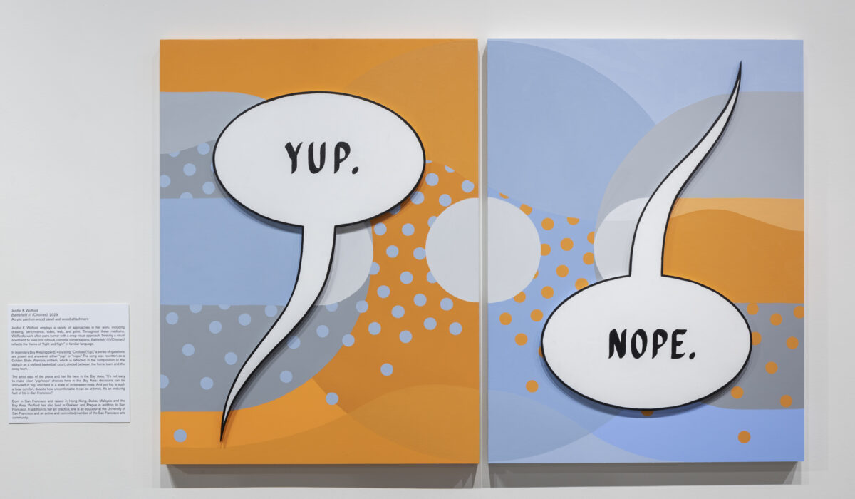 Two rectangle works of art hanging on a wall with words 'Yup' and 'Nope' in bubbles