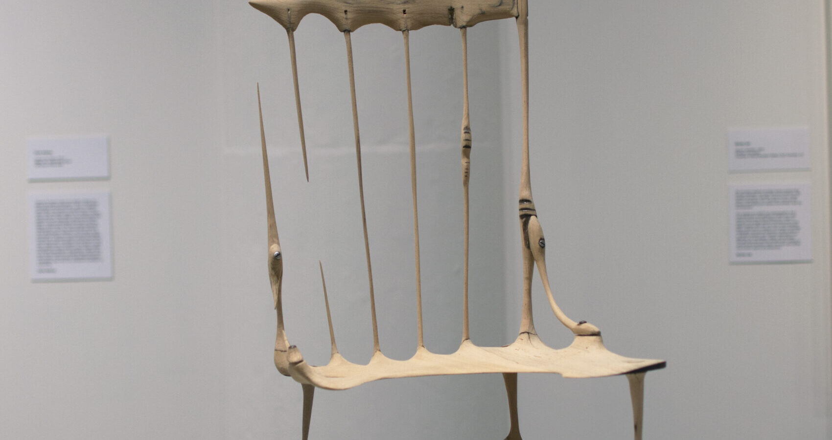 Photo of a Wooden chair art piece in an exhibition