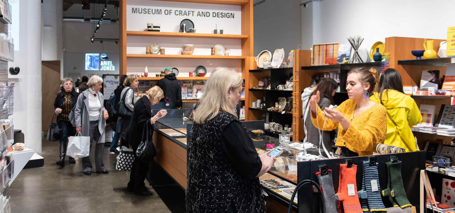 A photo of people shipping inside the Museum Store during Style '19