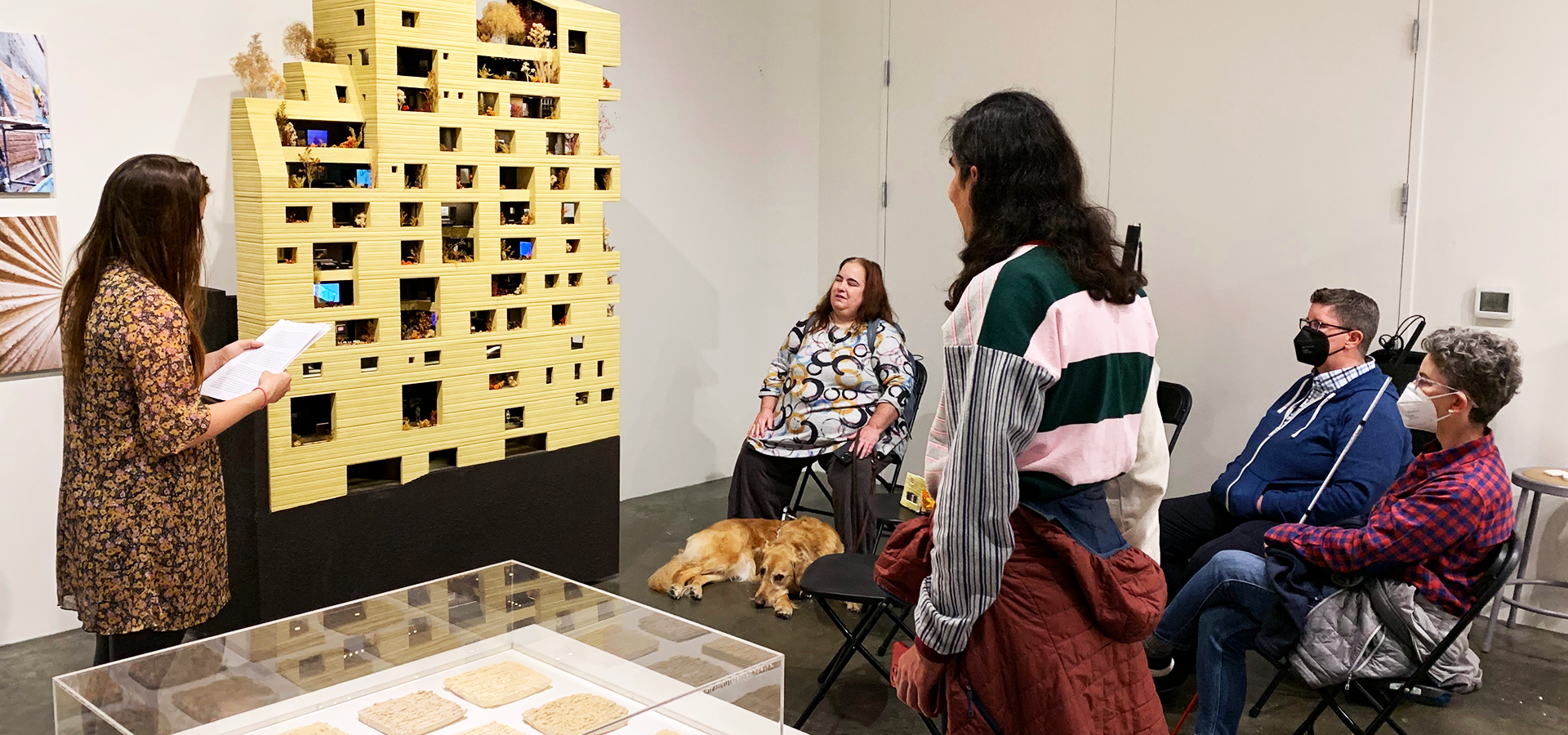 Photograph of people attending a tour inside the Museum of Craft and Design Gallery