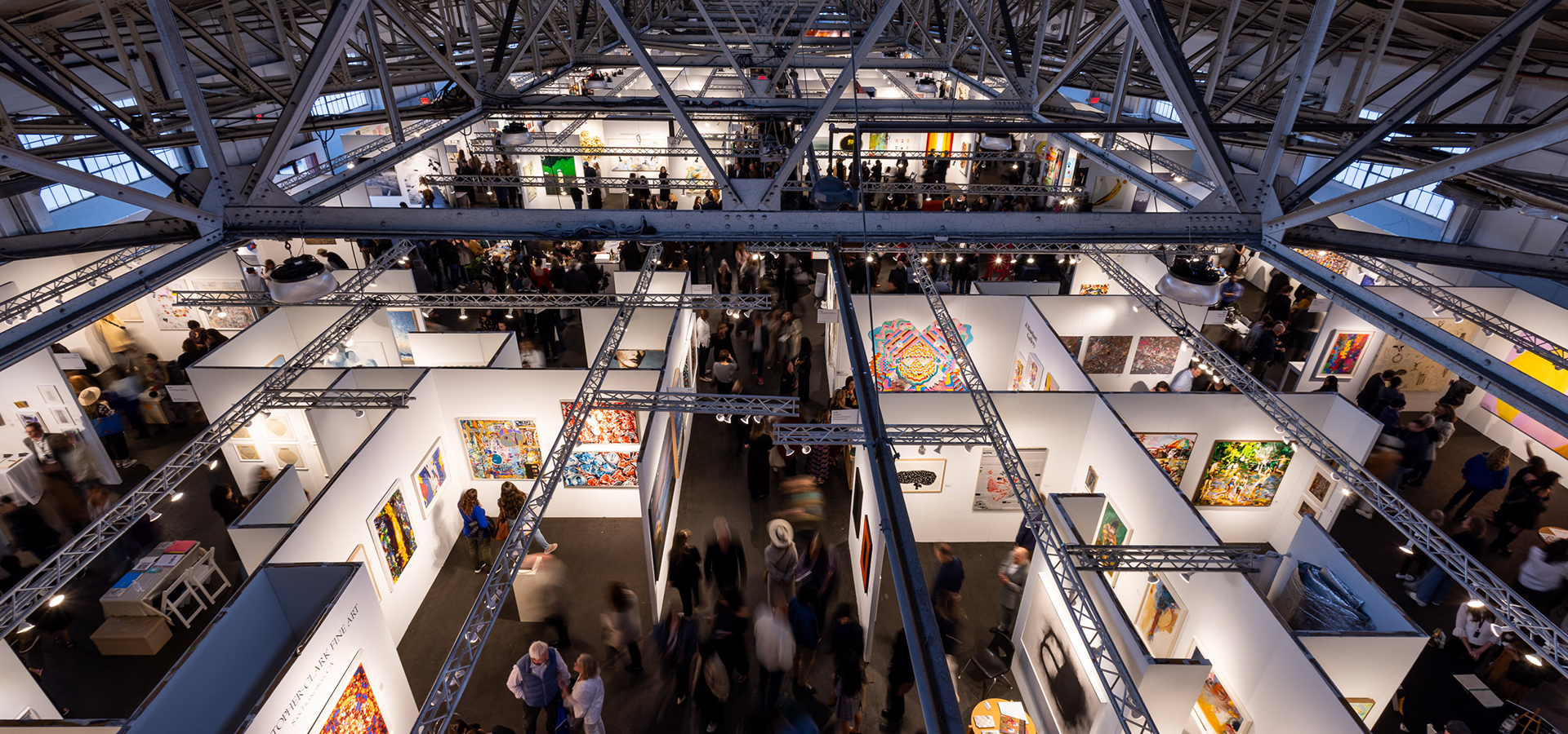 Aerial photograph of the 2024 San Francisco Art Fair, capturing gallery booths and bustling crowds.