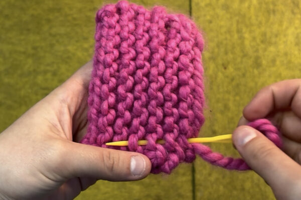Section 4 - Finishing Work: Weave in Ends: 1. Use tapestry needle to weave in tail ends of work. 2. Trim excess yarn once secure. 3. Admire your finished knit swatch!