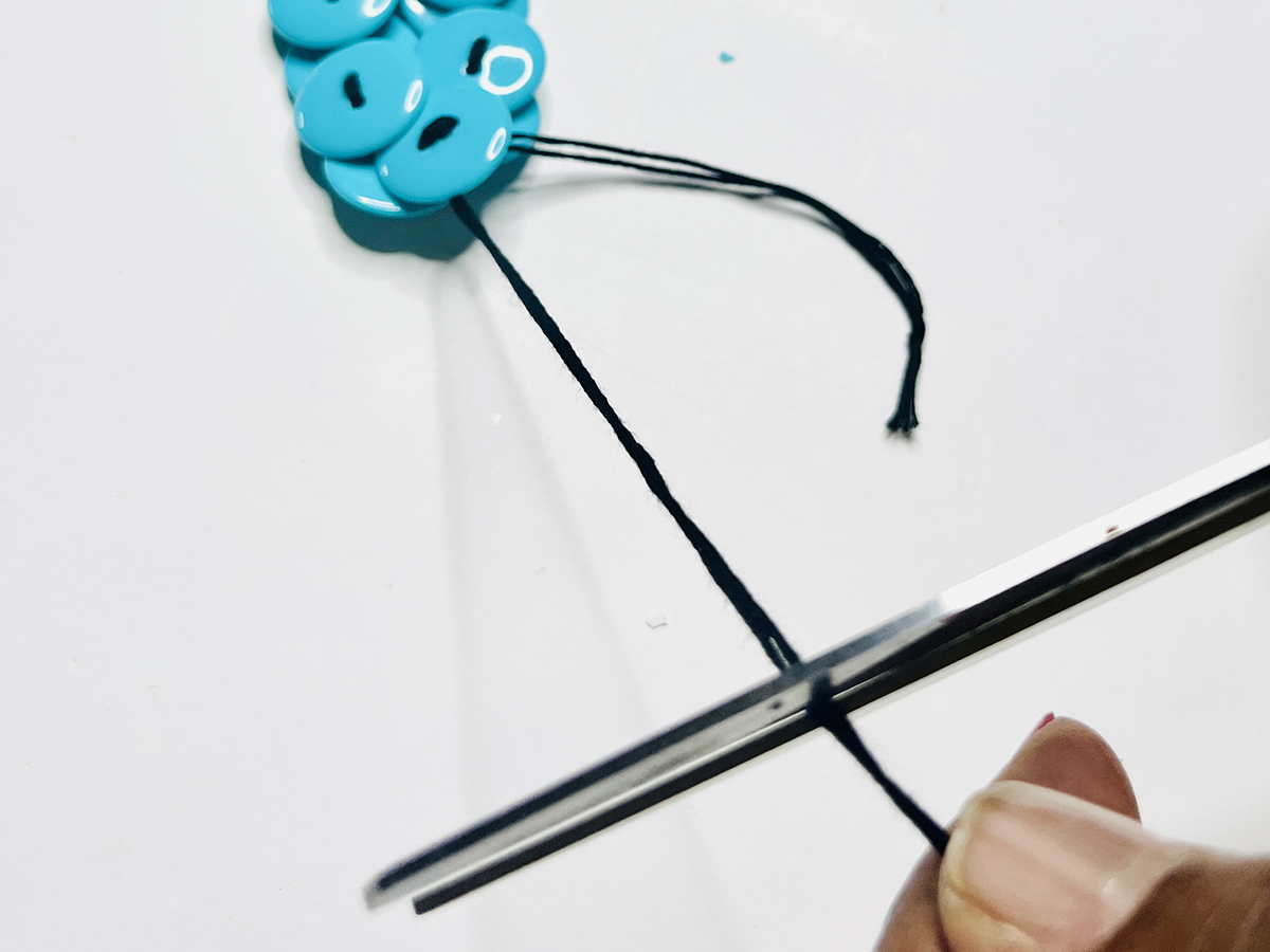 Step 6 - Join Necklace Ends Together: Clip the remaining pieces of hanging thread.