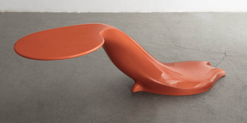 Image of elongated orange table artwork