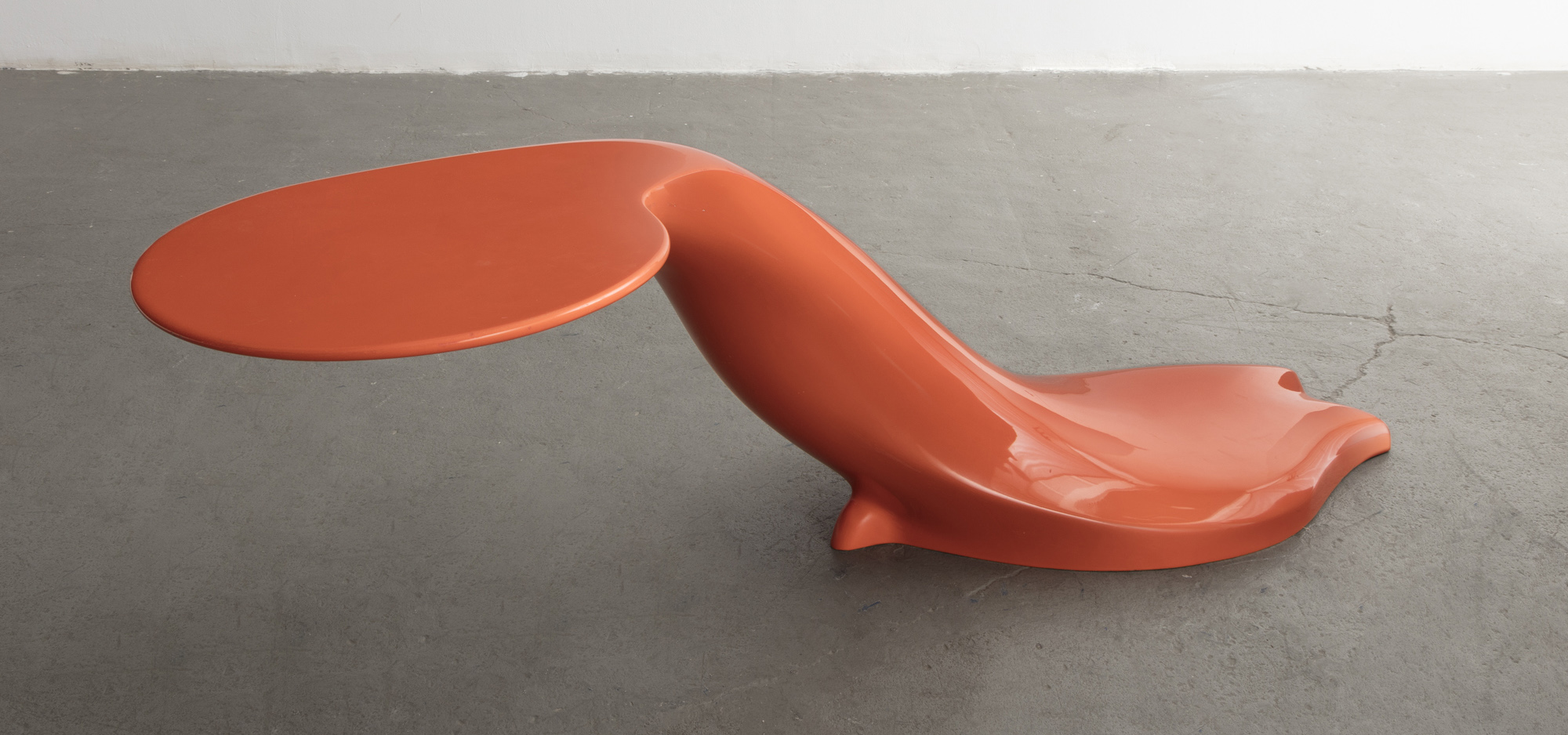Image of elongated orange table artwork
