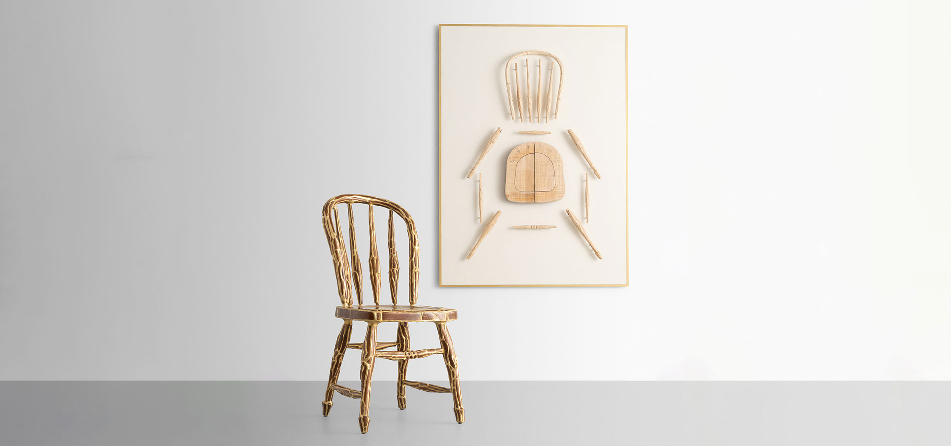 photo of artwork of chair and chair on wall separated.